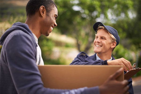A delivery driver delivering a product