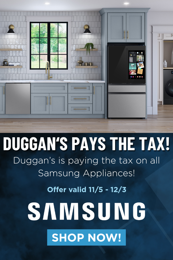 A modern kitchen with light blue cabinets, stainless steel Samsung appliances, and a large window over the sink. Text below the kitchen reads: “DUGGAN’S PAYS THE TAX! Duggan’s is paying the tax on all Samsung Appliances! Offer valid 11/5 - 12/3. SAMSUNG. SHOP NOW!