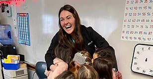 The Bekins Brand Ambassador, who volunteers with the Professional Women in Building group in Grand Rapids, helps them celebrate Women in Construction week by reading Catie the Contractor Leads the Crew to local kindergarten and first grade classes.