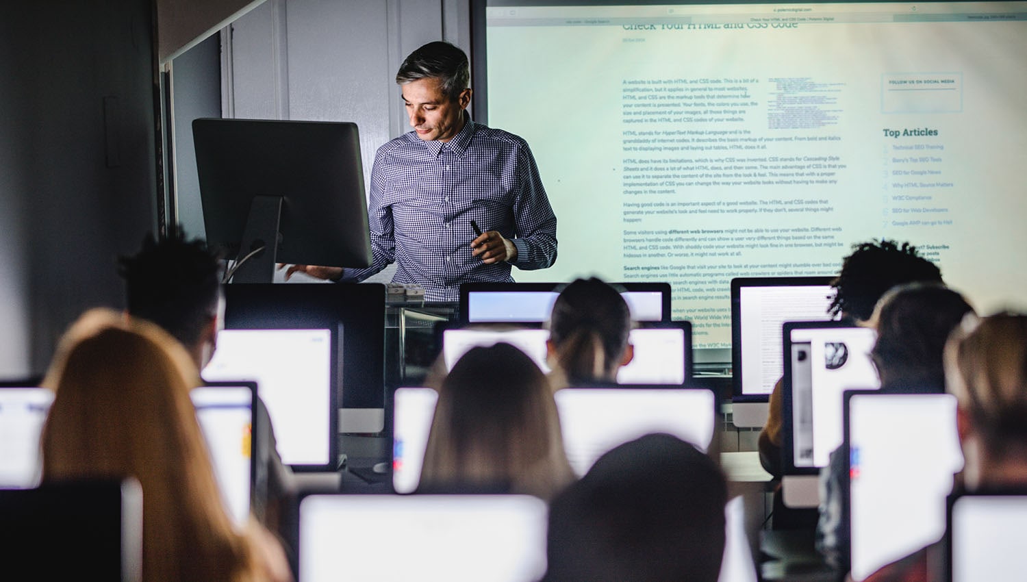 Professor in front of classroom